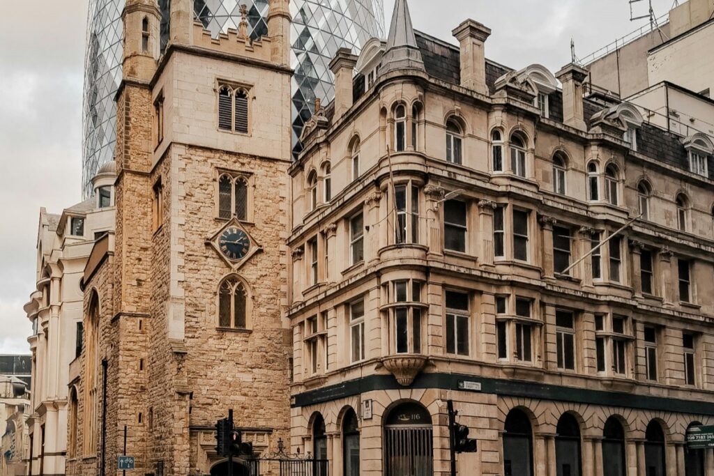 This image features a juxtaposition of architectural styles in the UK. An old stone building with a clock, likely of historical significance, stands alongside a more modern, ornate building, with a contemporary glass - facaded structure visible in the background. When it comes to running effective ads on Facebook UK, using images like this can be beneficial. You can target users interested in architecture, history, or urban development. For example, if you're promoting a travel agency, a historical tour, or even a property - related business, highlight the contrast between the old and the new in the UK's cityscapes. Craft compelling ad copy that relates to the visual, asking questions like "Ever wondered about the stories behind these iconic buildings?" and include a clear call - to - action to drive engagement and conversions.