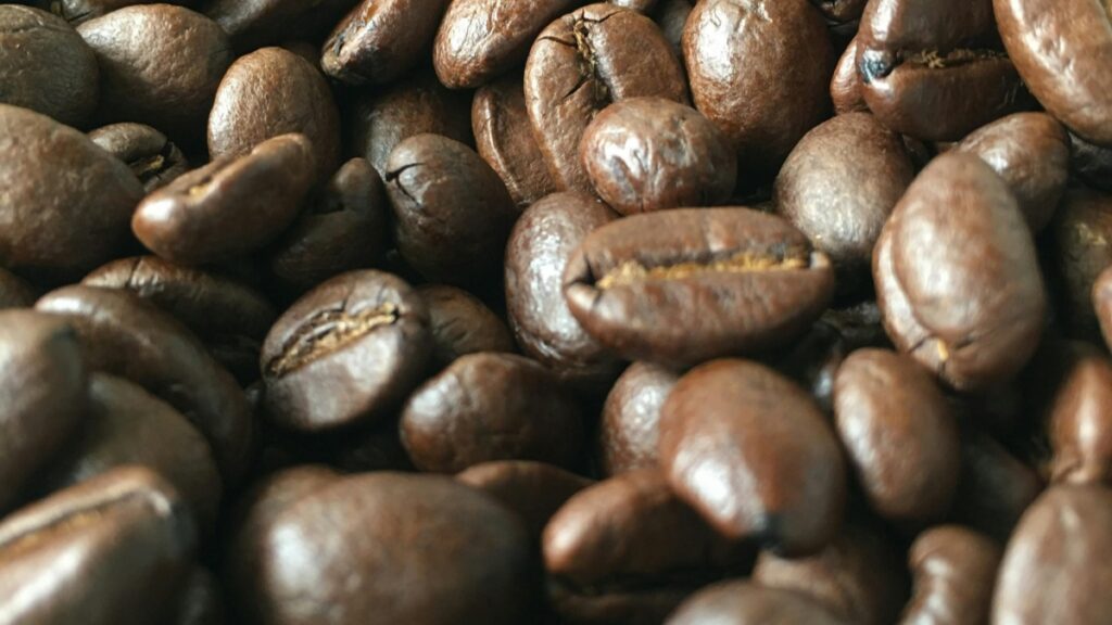 A close-up view of freshly roasted coffee beans.How to Make Money on Bigo Live:A Comprehensive Guide offers insights into monetising live streaming with virtual gifts and sponsorships.